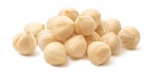 Pile,Of,Peeled,Roasted,Hazelnuts,Isolated,On,White,Background.,Package