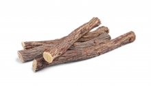 Dried,Sticks,Of,Liquorice,Root,On,White,Background