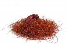 Chilli,Threads,And,Chilli,Pod,Against,White,Background
